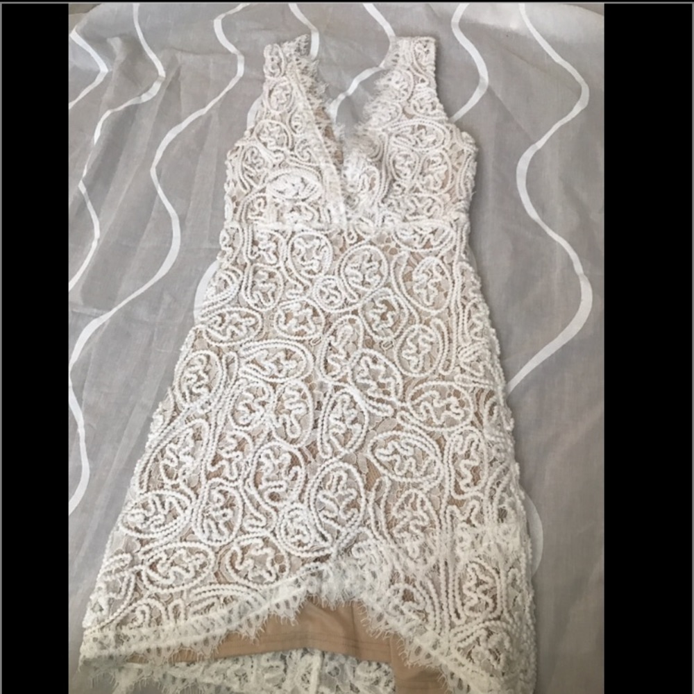 White beautiful dress very detailed and fitted