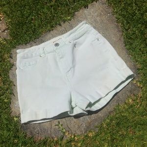 Very light blue (almost white) high waisted shorts