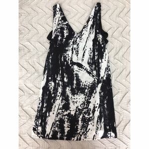 Back and white dress with side cut outs