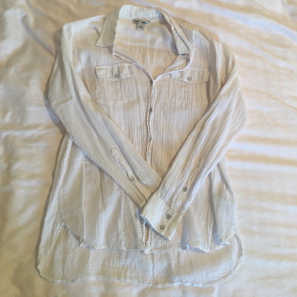 Collared white long sleeved cotton shirt