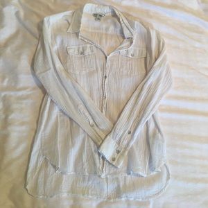 Collared white long sleeved cotton shirt