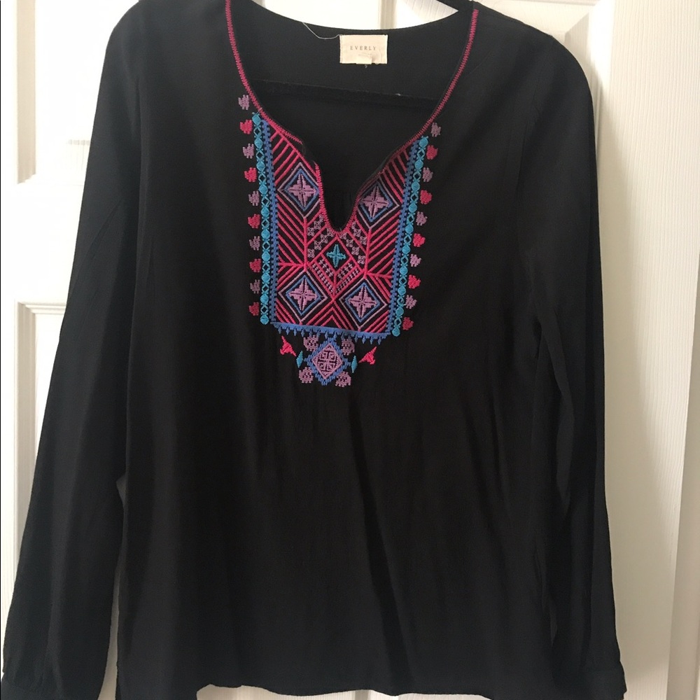Long sleeve, embroidered blouse.