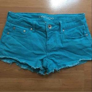 Teal blue cut off jean shorts