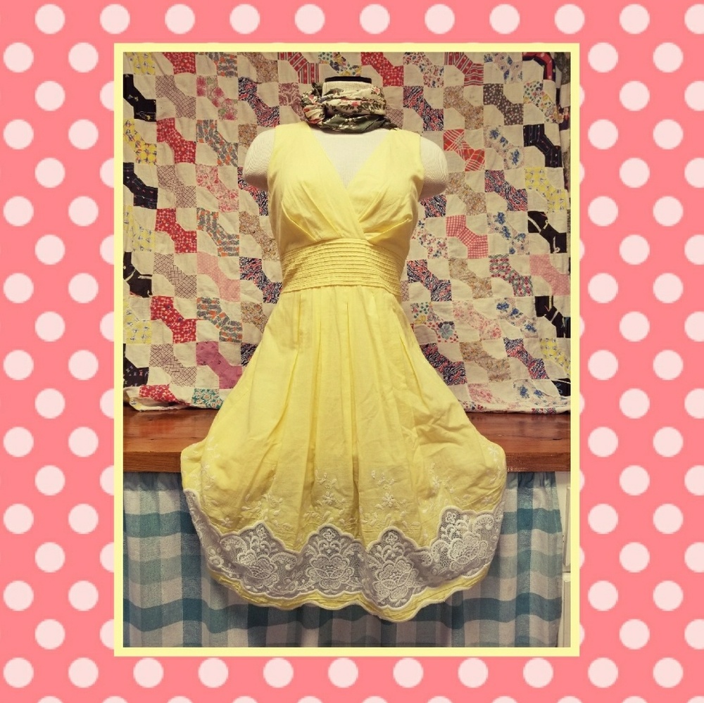 Yellow midi dress with lace.