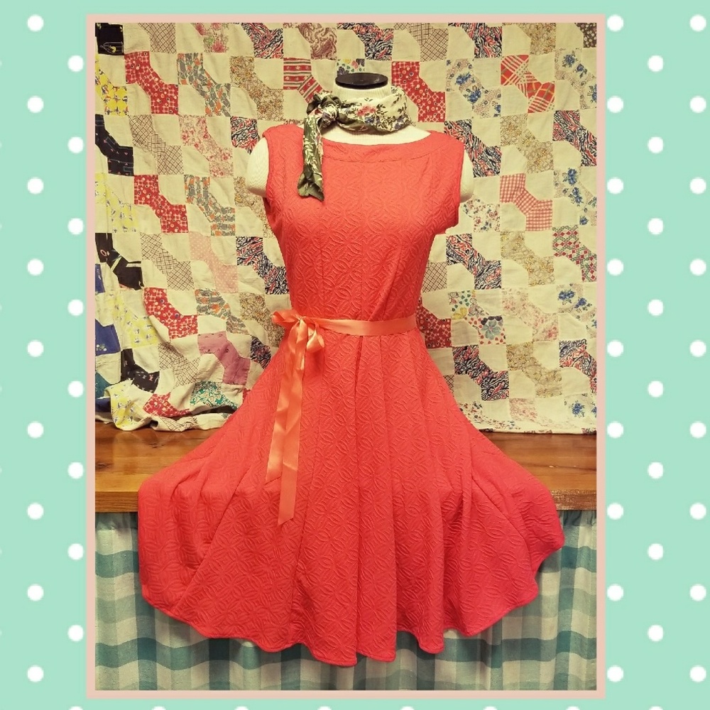 Adorable coral dress.