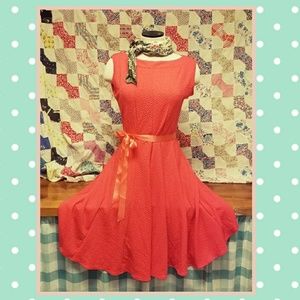 Adorable coral dress.