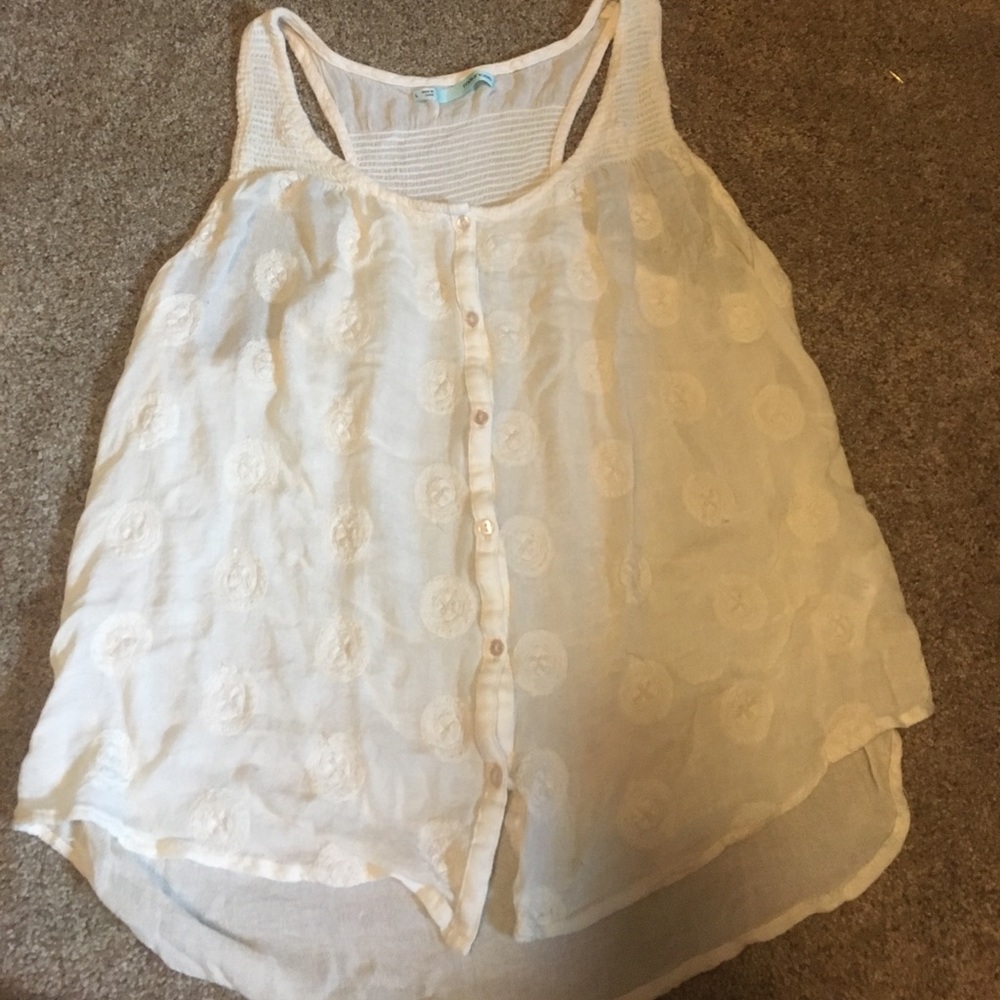 A cream racerback tank top