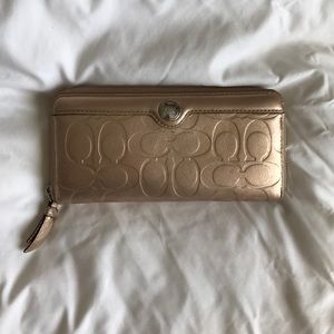 Gold Coach Clutch Wallet