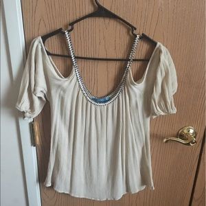 shirt with peek-a-boo shoulder