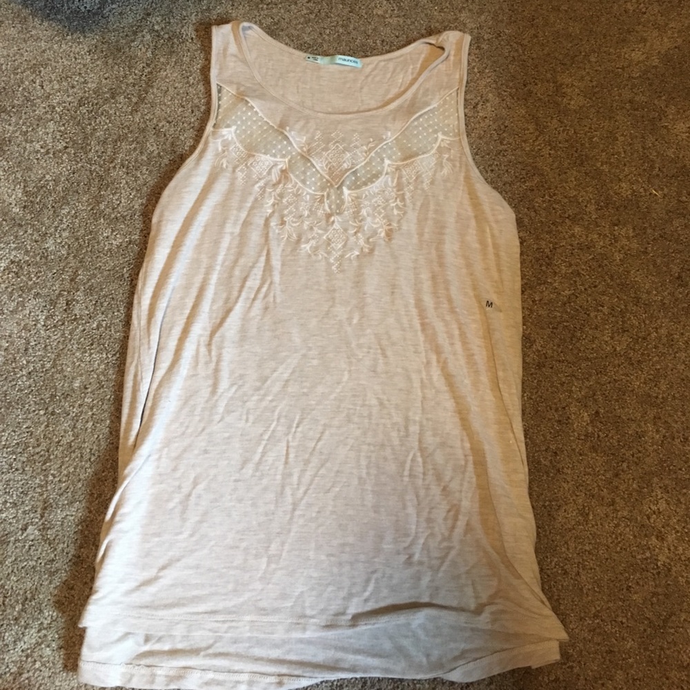 A cream colored tank top