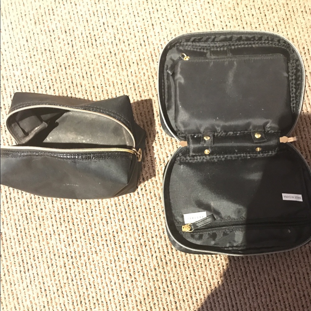 Two black makeup cases