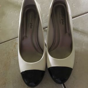 Black and cream high heel shoes