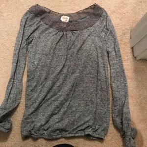 long sleeved grey shirt