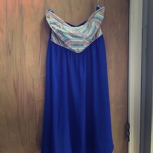 Size Medium, strapless dress. Never been worn.