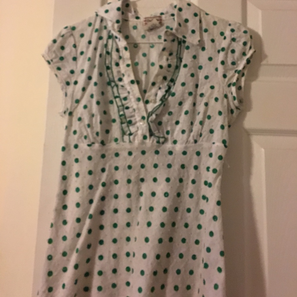 White blouse with green polka dots
