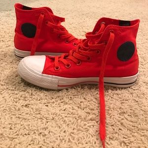 Red Converse high tops