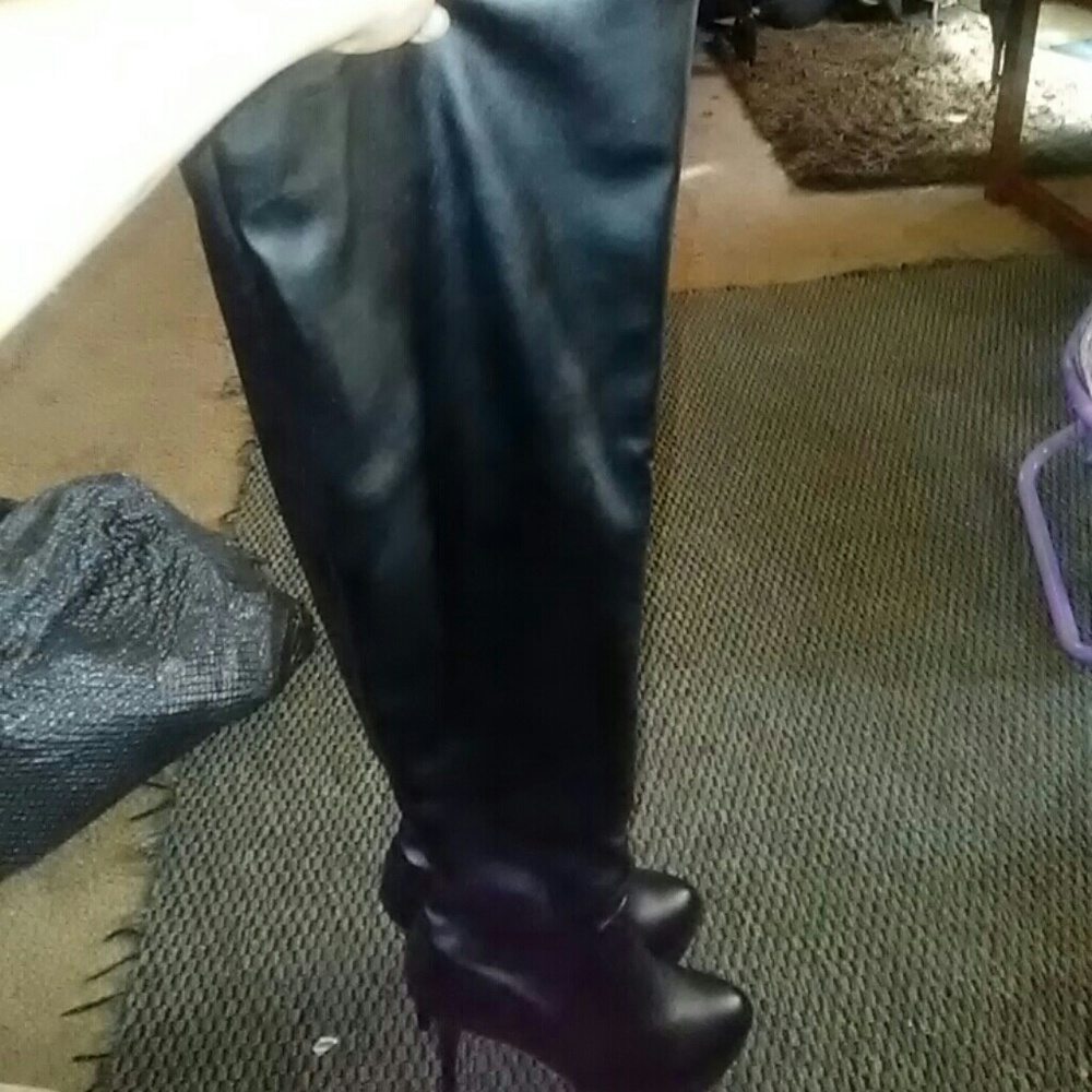 Thigh high leather boots