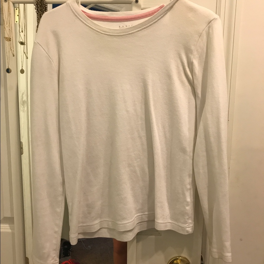 white long sleeve top.