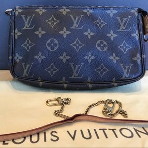 Louis Vuitton wristlet.