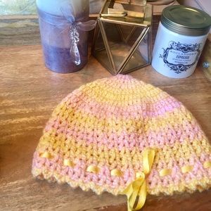 light pastel orange yellow knit hat