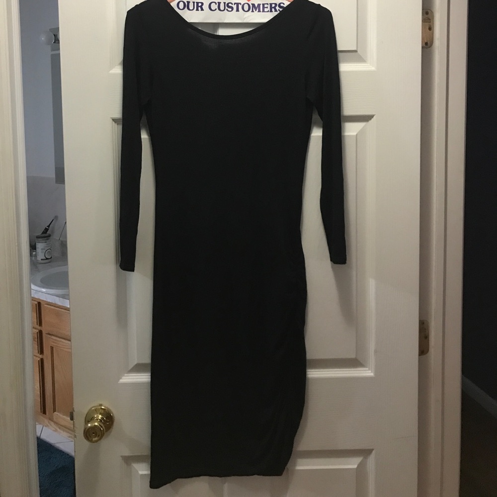 Long sleeve black midi dress with low back