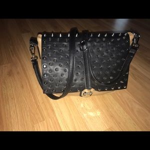 Studded nude and black purse