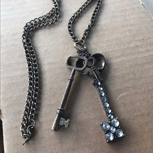 Bronze / gold key necklace with gems