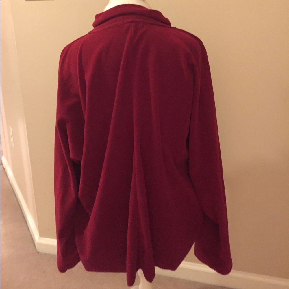 An oversized red sweater