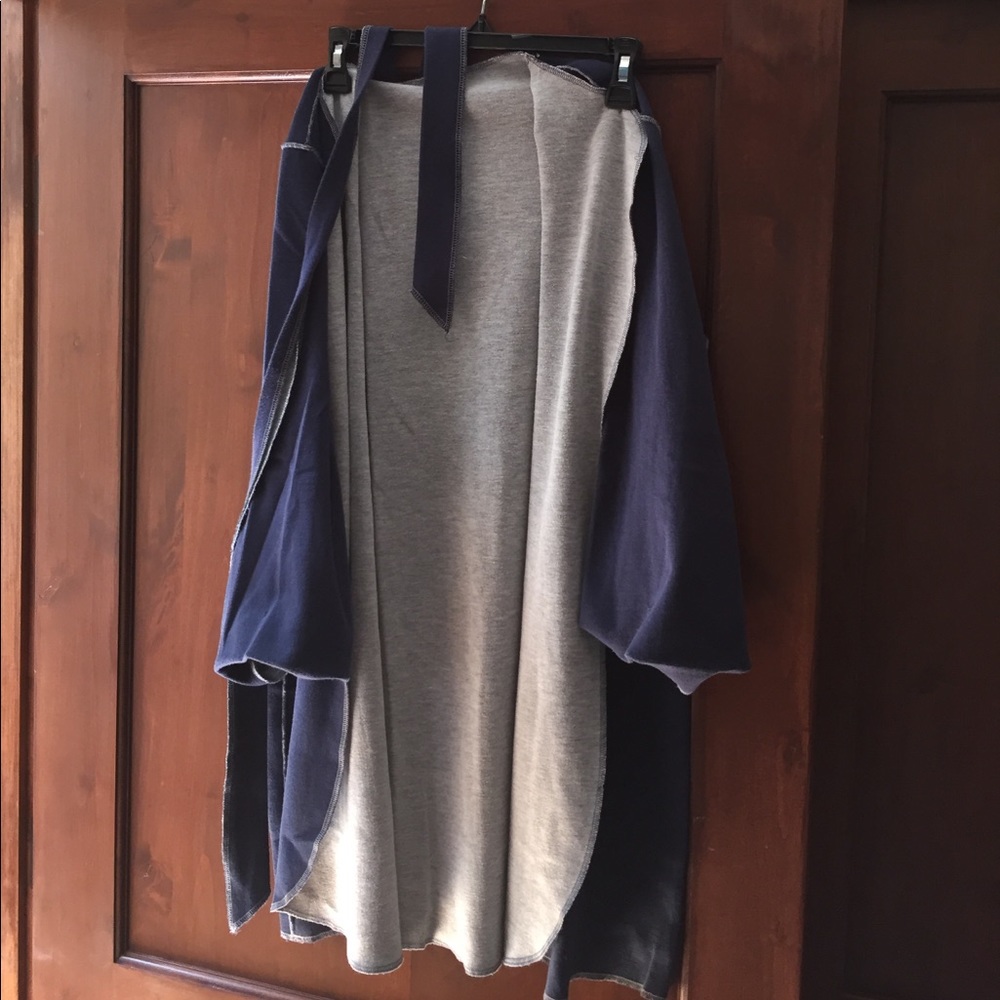 Reversible blue and gray bed jacket