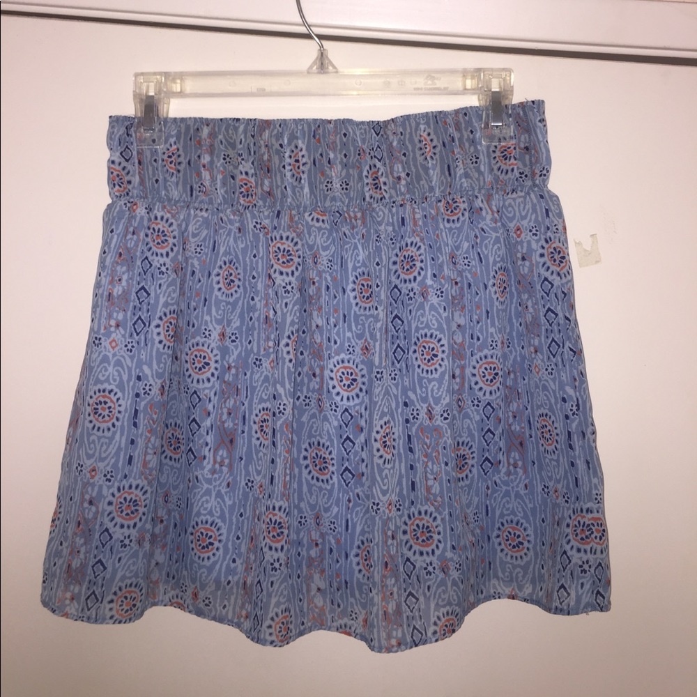 Blue, orange/coral, and white pattern skirt
