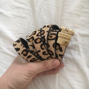 Reversible cheetah print black patent belt