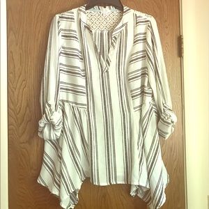 Cream and black flowy blouse with lace detail