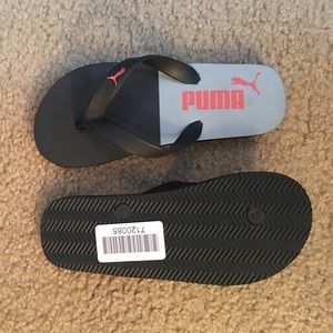 Little boy puma flip flops