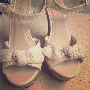 Cream colored wedges with bow ties. Brand New*