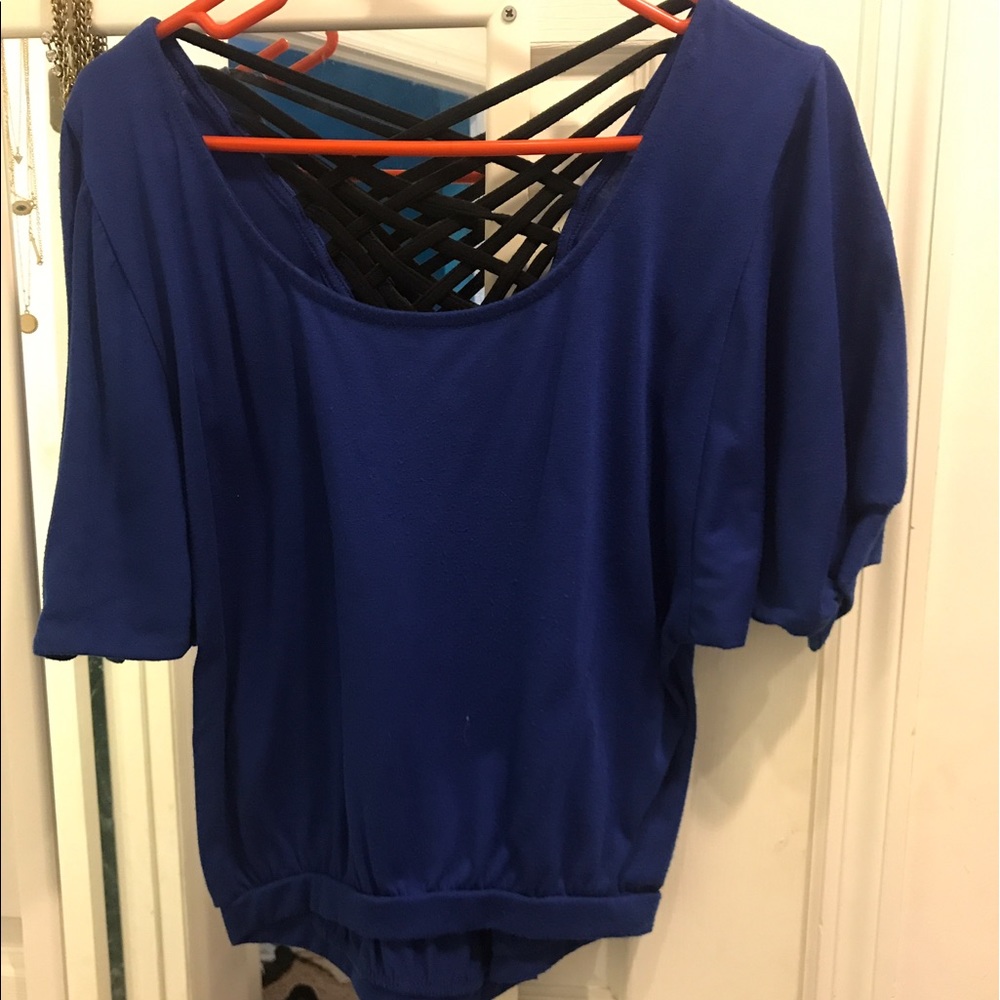 Blue blouse with cross cross back.