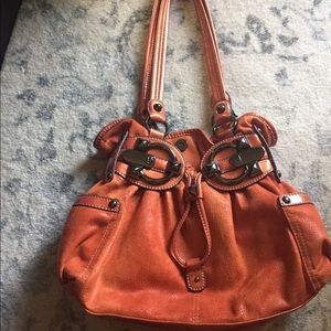 Kathy Van Zeeland orange satchel purse