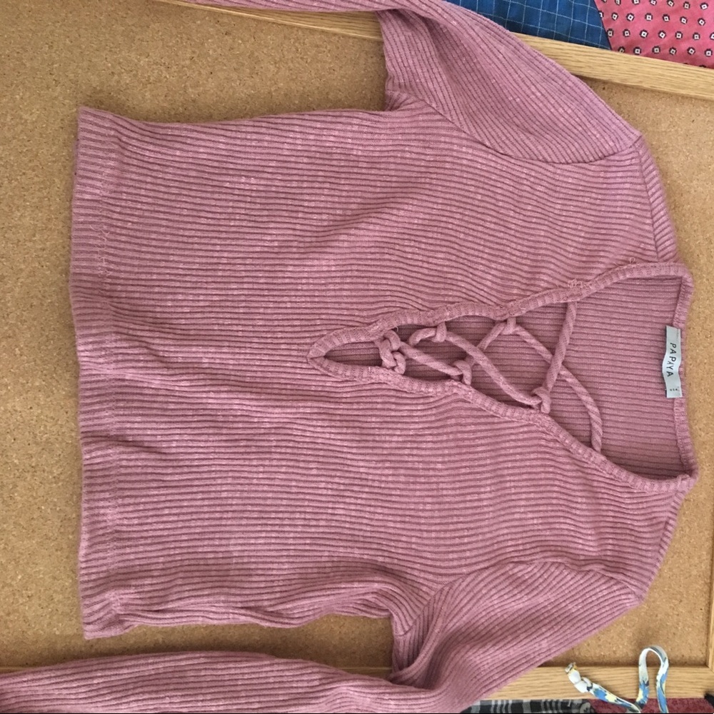 Salmon colored long sleeve lace up crop top