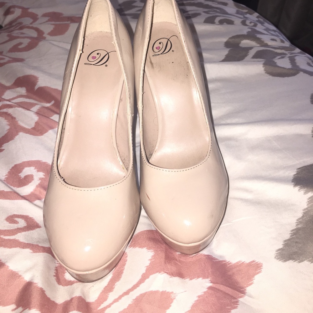 Beige heels .
