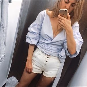 Wrap, long tie blouse with bell sleeves