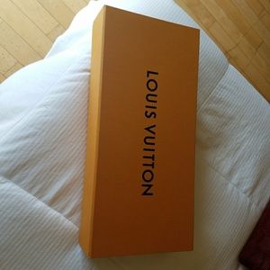 Brand new Louis Vuitton magnetic box with ribbon