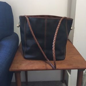 Vintage black leather bag with brown stripes
