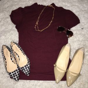 Maroon thin blouse.
