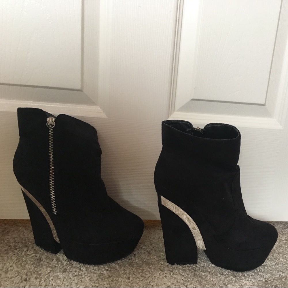 Black and silver heeled ankle booties. Size 8.5
