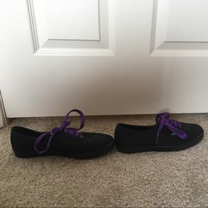Sparkly black vans with sparkly purple laces