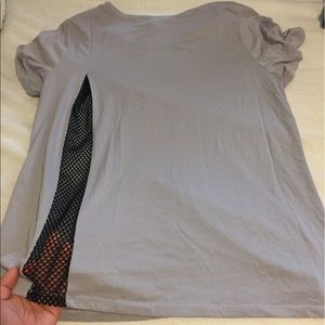 Size medium fabletics t-shirt with mesh.