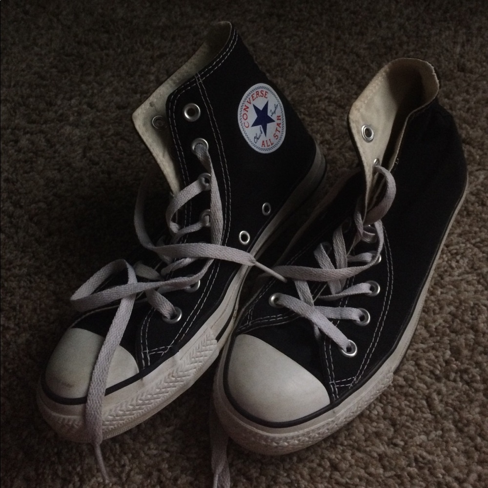 Black and white high top converse