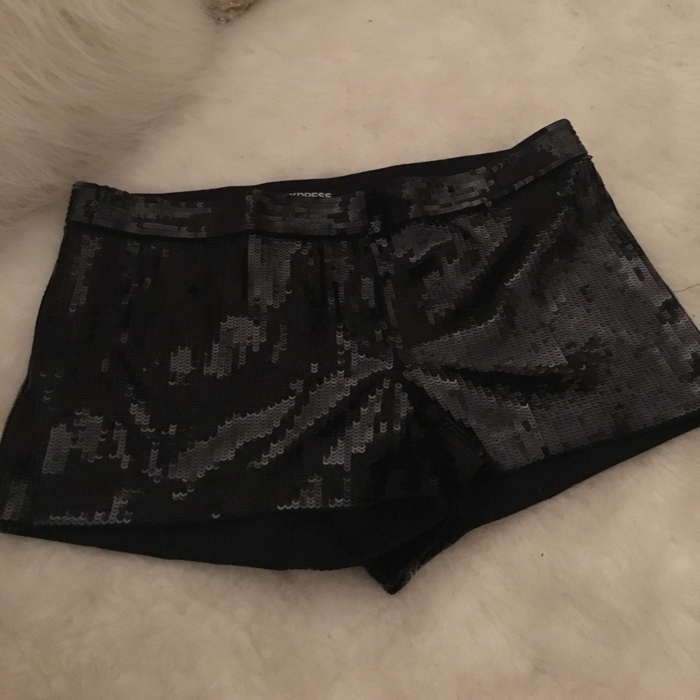 Sequin black shorts.