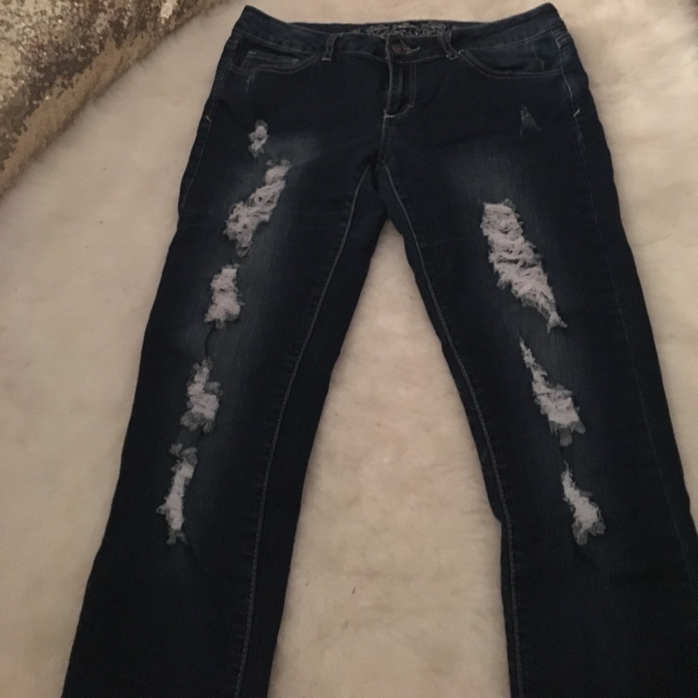 Dark wash distressed skinny jeans