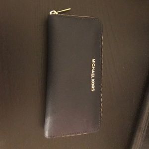 Micheal Kors wallet.