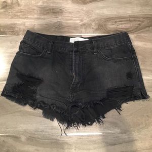 black ripped jean shorts